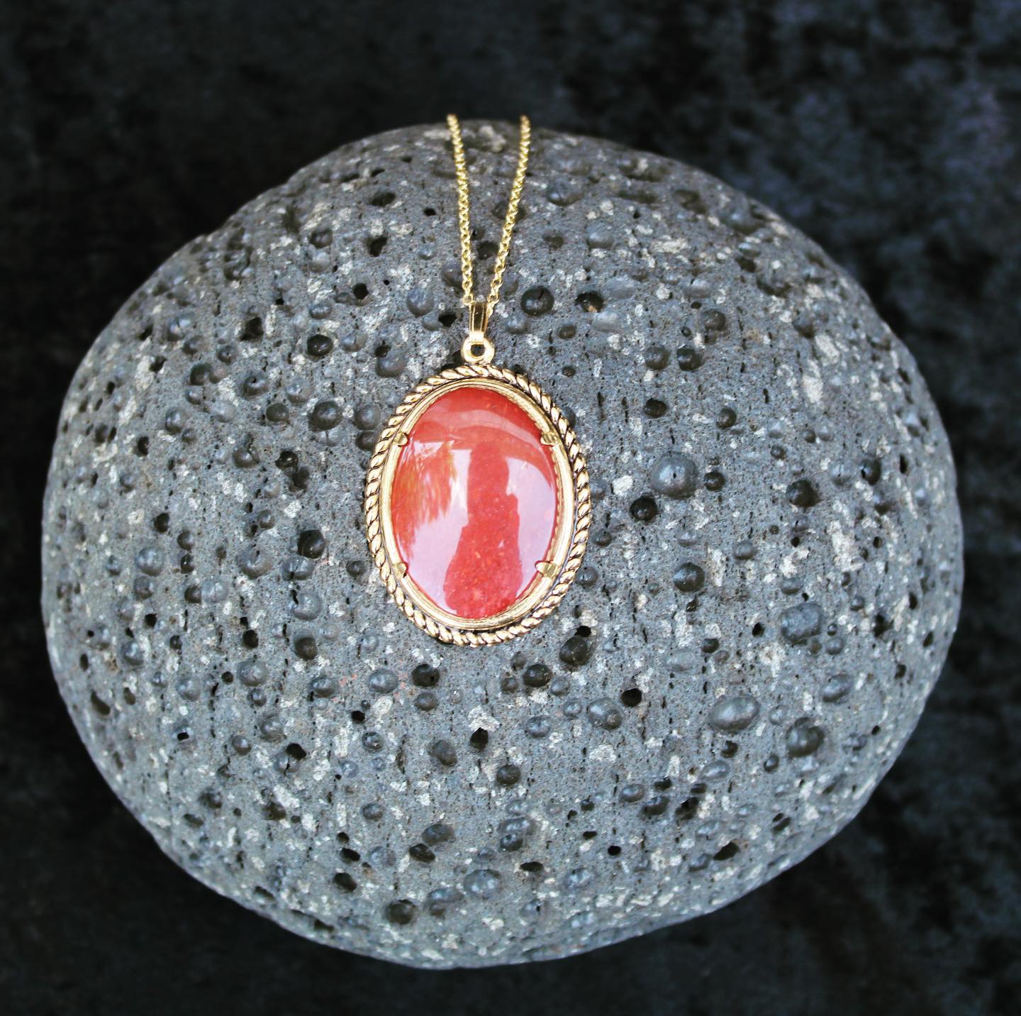 Necklace with New Zealand red Jasper, pure bright red, hand polished to a 14x10mm cabochon and set in a gold plated setting with 19 inch chain.